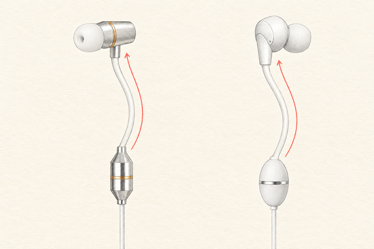 Illustration showing the cable reaching the speaker housing, then a hollow air tube carrying sound to the earpiece